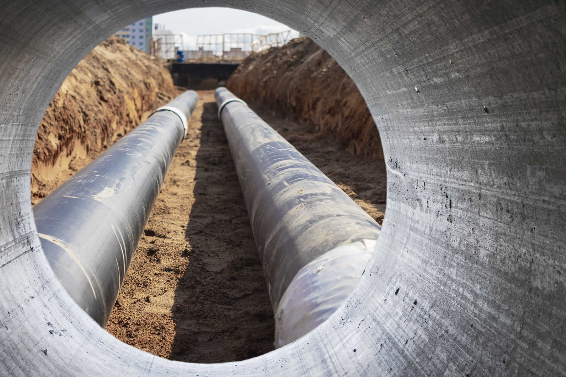 modern-water-supply-sewerage-system-underground-pipeline-works-water-supply-wastewater-disposal-residential-city-closeup-underground-utilities-view-from-big-pipe.jpg